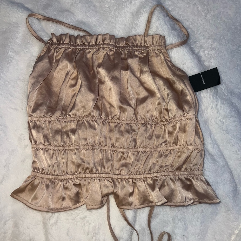 Champagne colored open back silk top